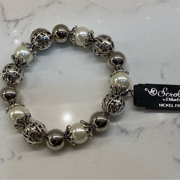 Scroll bracelet. Never worn. Retailed for $28. Asking $22. - Picture 1 of 6